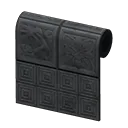 black botanical-tile wall